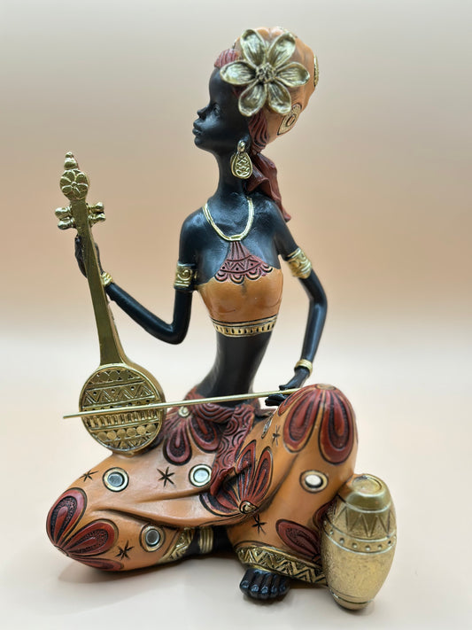African Musician Figurine – 22 cm Handmade Resin Sculpture in Orange & Gold, Cultural Home Décor Art | Nestora Arts