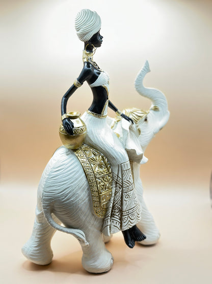 Elegant African Woman Riding Elephant Statue – 32 cm Resin Figurine for Luxury Home Décor & Unique Gifts | Nestora Arts