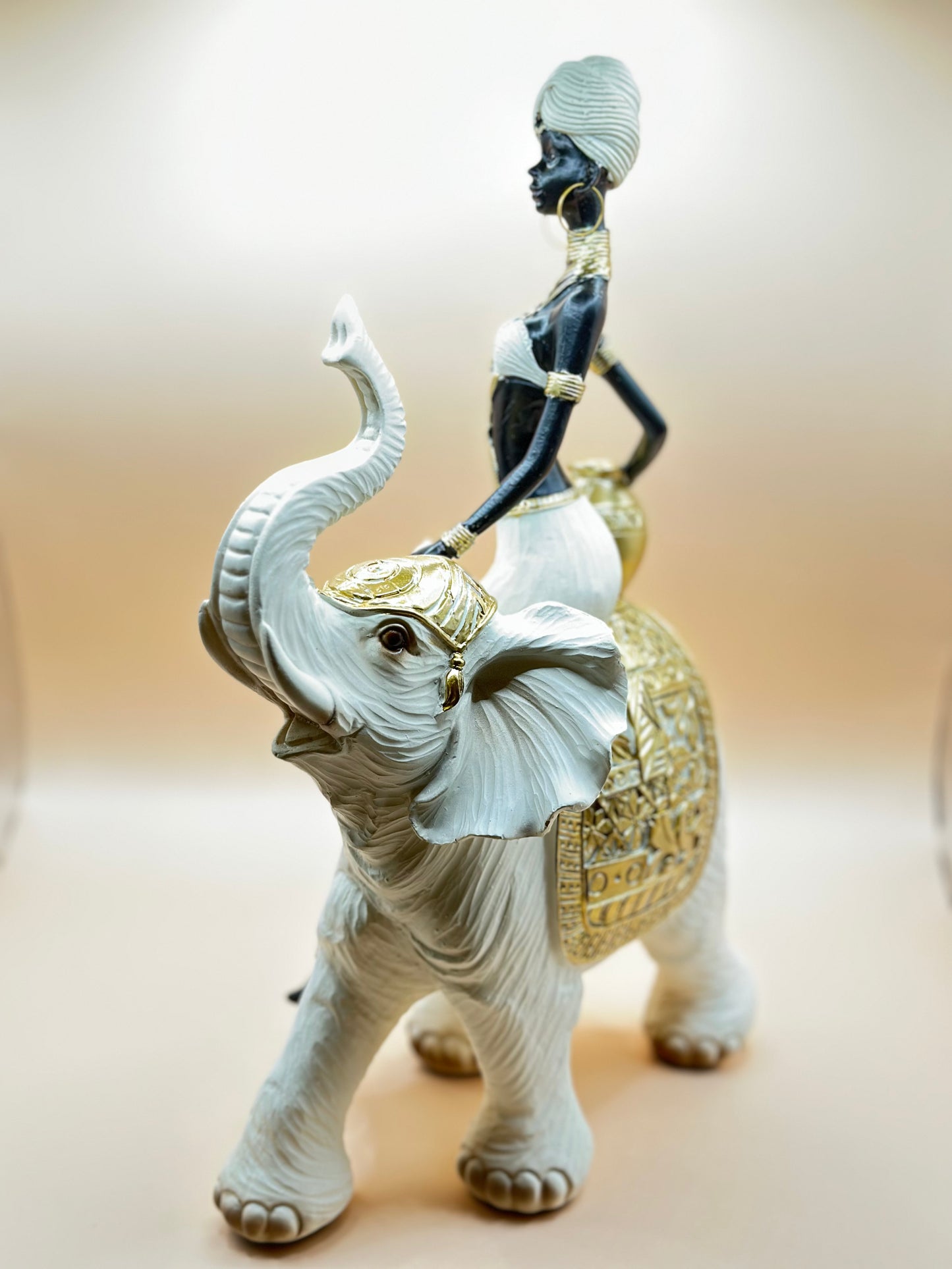 Elegant African Woman Riding Elephant Statue – 32 cm Resin Figurine for Luxury Home Décor & Unique Gifts | Nestora Arts